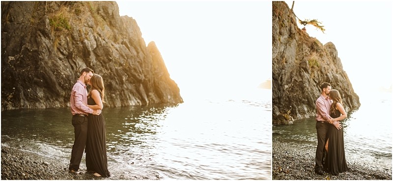 Snohomish & seattle wedding photographer | gsquared weddings photography a couple stands embracing on a rocky deception pass beach at sunset with steep cliffs and gentle waves in the background The warm august light creates a golden romantic atmosphere perfect for an engagement moment | wedding photo by gsquared weddings