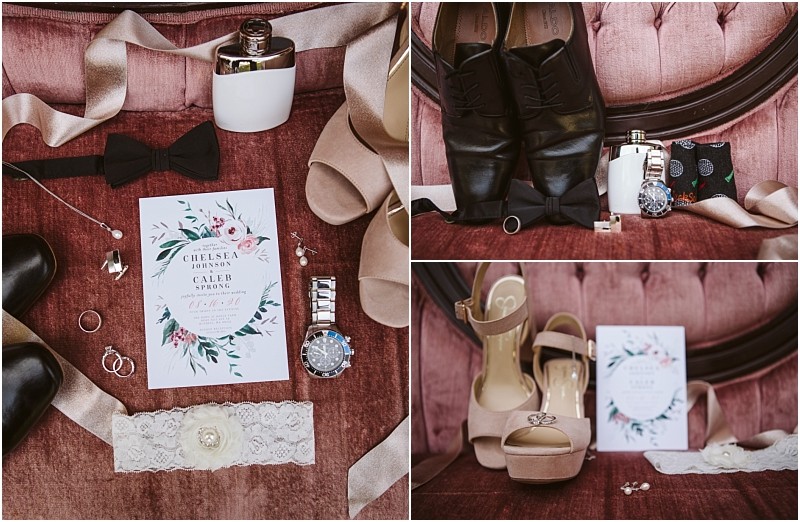 Snohomish & seattle wedding photographer | gsquared weddings photography a collage of wedding accessories on a pink velvet chair at a summer barn at holly farm wedding grooms black shoes bow tie watch flask rings brides nude heels lace garter perfume and a floral wedding invitation | wedding photo by gsquared weddings