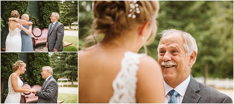 Snohomish & seattle wedding photographer | gsquared weddings photography a bride in a white dress shares a happy emotional moment with an older man in a suit outdoors at a summer barn at holly farm wedding they hug hold hands and smile warmly at each other | wedding photo by gsquared weddings