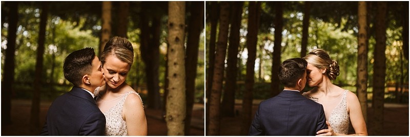 A couple dressed in formal wedding attire embrace and share an intimate moment in a sunlit snohomish forest surrounded by tall trees The scene is warm and romantic Snohomish wedding photography