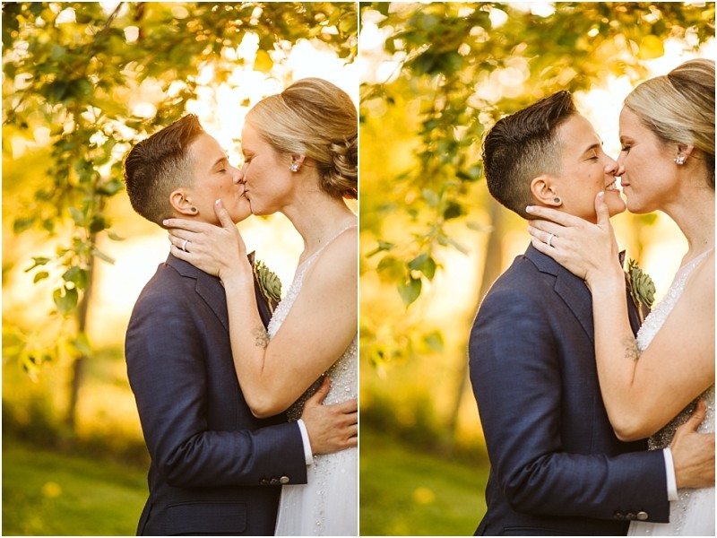 A couple dressed in wedding attire embraces and shares a kiss outdoors in snohomish surrounded by lush greenery and warm sunlight Snohomish wedding photography
