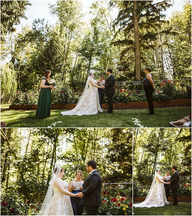 A bride and groom exchange vows outdoors in a lush snohomish garden surrounded by trees and flowers accompanied by two attendants in formal attire during a daytime wedding ceremony Snohomish wedding photography