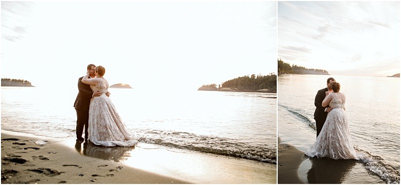 A bride and groom embrace on a sandy beach at sunset standing in shallow water with small islands visible in the distance under a bright skya serene scene reminiscent of snohomish romance Snohomish wedding photography