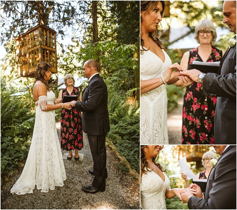 A bride and groom exchange rings during a snohomish forest wedding ceremony with an officiant standing behind them The bride wears a white dress and the groom a dark suit close ups show the ring exchange Snohomish wedding photography
