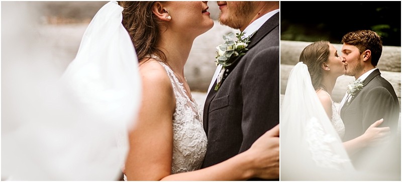 A bride and groom dressed in wedding attire embrace closely The bride wears a white lace dress and veil while the groom is in a dark suit with a boutonniere They share an intimate moment outdoors in scenic snohomish Snohomish wedding photography