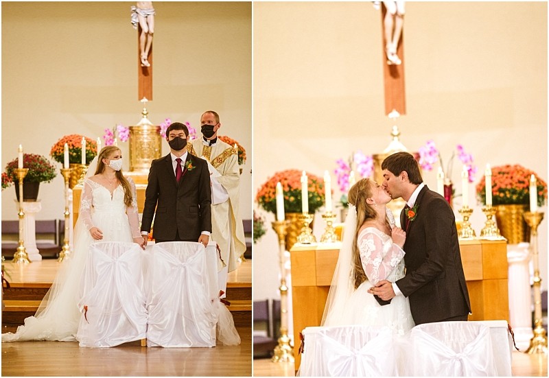 A bride and groom in wedding attire stand at the altar of a snohomish church both wearing masks in one photo in the next they kiss unmasked before the altar surrounded by candles flowers and a crucifix Snohomish wedding photography