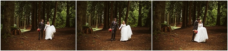 A bride and groom walk hand in hand through a snohomish forest surrounded by tall trees and dappled sunlight smiling and holding a bouquet of red flowers in a series of three photos Snohomish wedding photography
