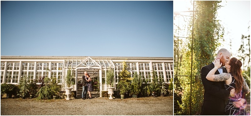 A couple embraces in front of a glass greenhouse under a clear snohomish sky on the right they share an intimate moment outdoors surrounded by lush greenery and sunlight Snohomish wedding photography