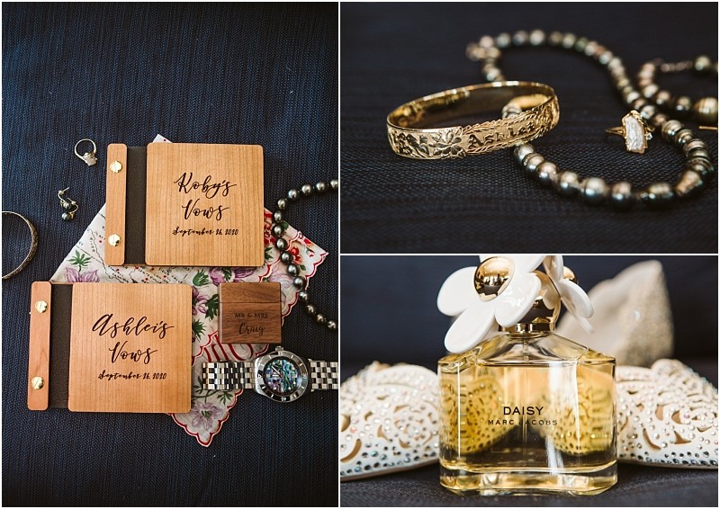 A collage shows wooden vow books jewelry a watch a handkerchief and a daisy by marc jacobs perfume bottle all laid out on dark fabricperfect details for an elegant snohomish wedding Snohomish wedding photography
