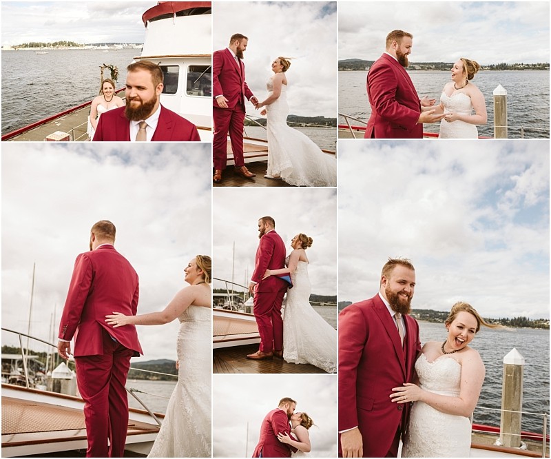 A bride and groom share a joyful first look and embrace on a dock by the water in snohomish The groom wears a red suit the bride a white gown and they smile and laugh together under a cloudy sky Snohomish wedding photography