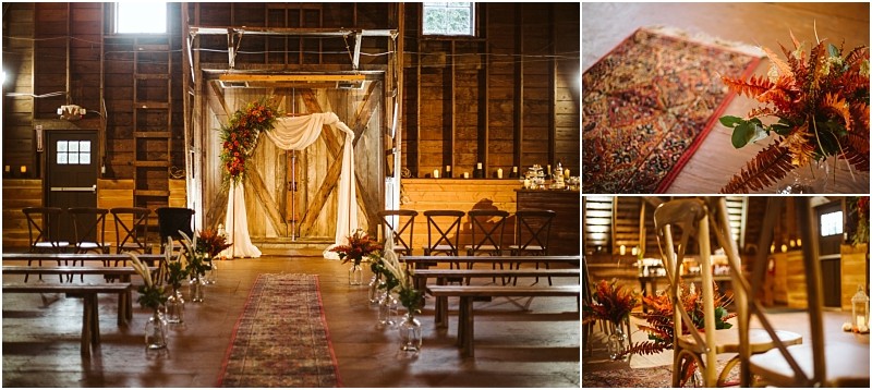 A rustic snohomish barn wedding setup with wooden benches floral arrangements an arch draped in fabric and a patterned rug down the aisle close ups show autumn themed flowers and wooden chairs Snohomish wedding photography