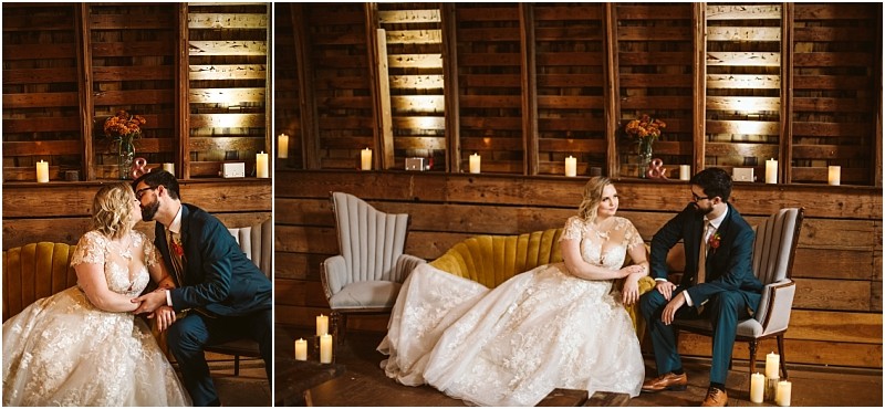 A bride and groom sit closely together on a vintage yellow couch in snohomish surrounded by candles and wooden walls sharing a romantic moment on their wedding day Snohomish wedding photography