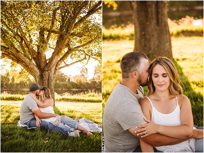 A couple sits on grass under a large snohomish tree embracing and sharing a kiss in one photo then sitting closely as the man whispers to the woman in the other both in casual outfits with warm sunlight filtering through the leaves Snohomish wedding photography A couple sits on grass under a large snohomish tree embracing and sharing a kiss in one photo then sitting closely as the man whispers to the woman in the other both in casual outfits with warm sunlight filtering through the leaves Snohomish wedding photography