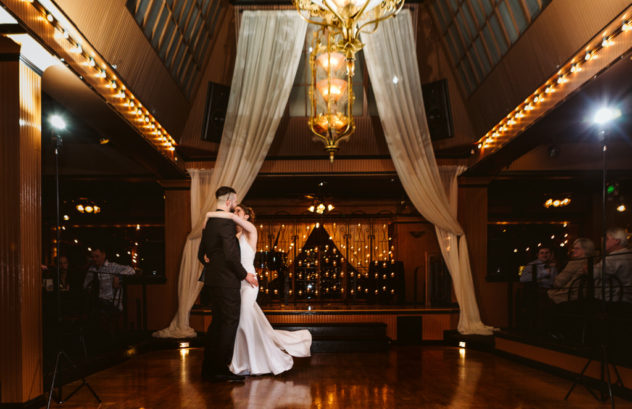 Lake union cafe bride and groom dancing