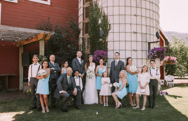 Ritter farm wedding party near the red barn and grain silo