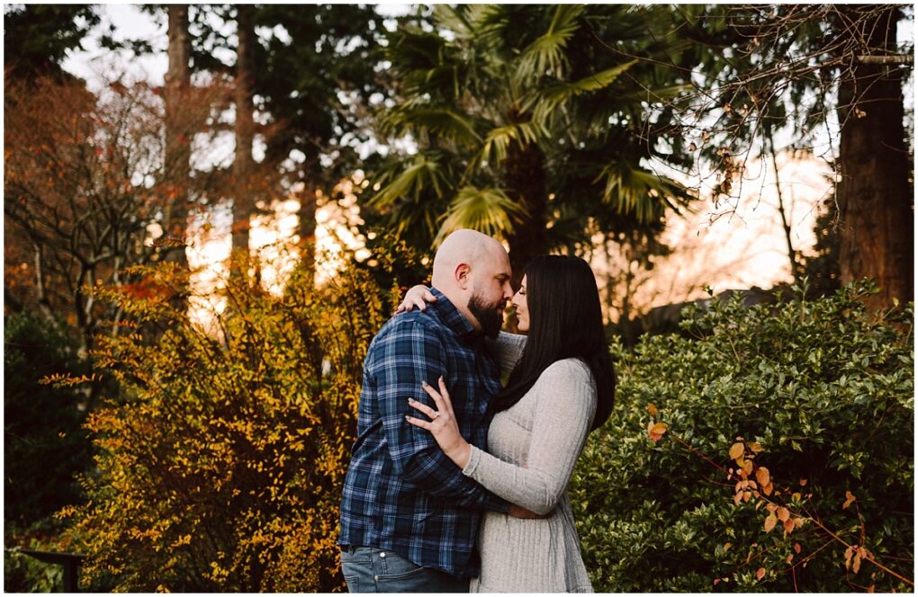 Everett engagement session at evergreen arboretum in the winter sunset
