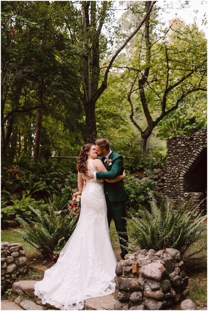 Wedding couple at the grotto at lodge at st edwards