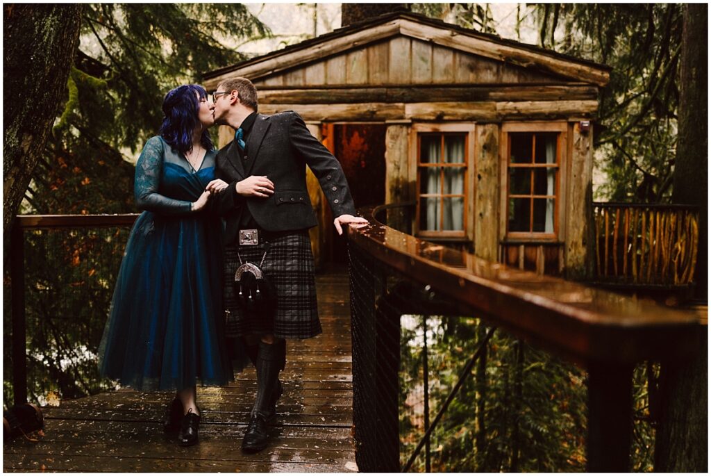 Treehouse wedding at treehouse point with bride in a teal blue dress by french knot couture and groom in a scottish kilt by the blue moon treehouse in fall city wa Treehouse wedding at treehouse point with bride in a teal blue dress by french knot couture and groom in a scottish kilt by the blue moon treehouse in fall city wa