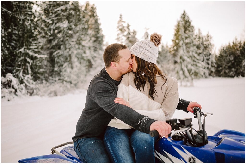 Snohomish snow engagement couple on a yamaha quad