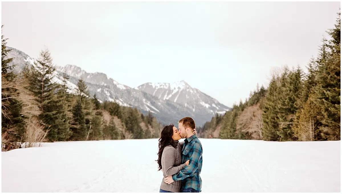 snoqualmie pass engagement session in the snow with the mountains