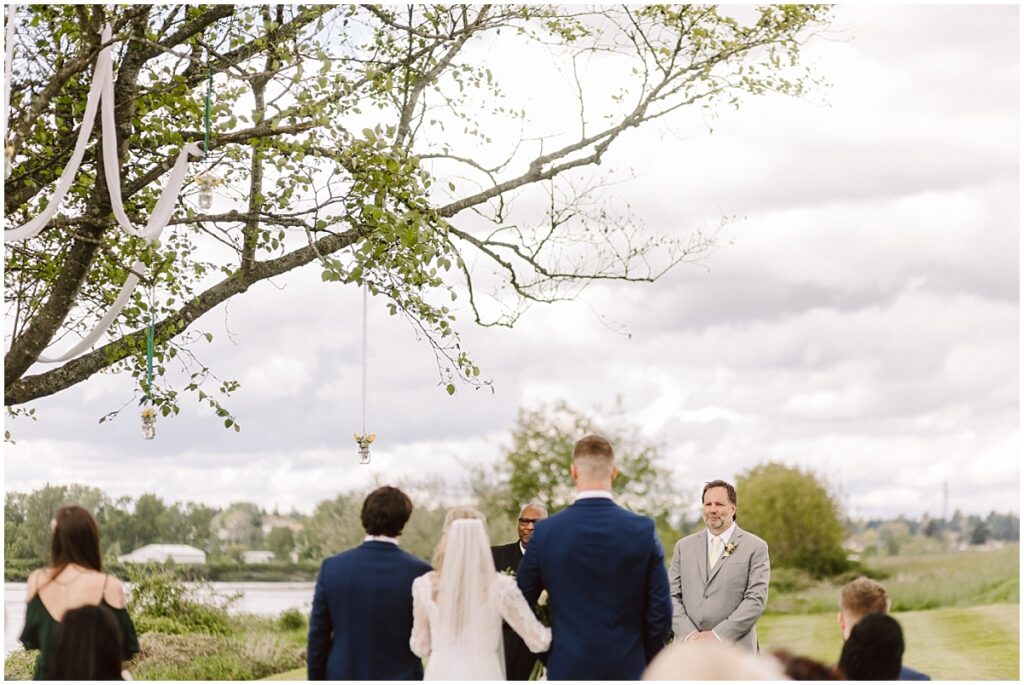 Pemberton farm wedding in the spring by the snohomish river with green gray and yellow colors Pemberton farm wedding in the spring by the snohomish river with green gray and yellow colors