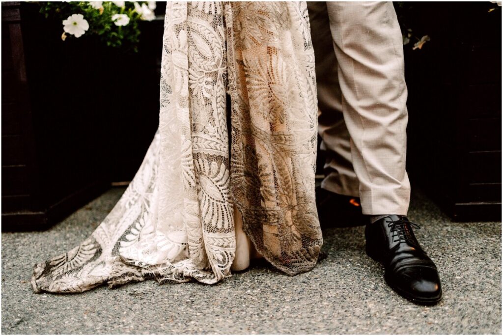 Gray bridge wedding on the day of the bolt creek fire near sultan washington bride and groom with ash on the bottom of wedding dress and suit