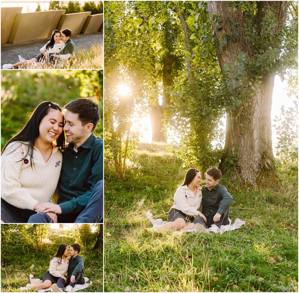 Snohomish Wedding Photographer GSquared Weddings A couple enjoys a sunny day at a park, celebrating their engagement. They sit together on a blanket, surrounded by lush green trees. The sunlight filters through the leaves, creating a warm, golden glow as they smile and share affectionate moments. Serving Seattle, Snohomish and Washington State