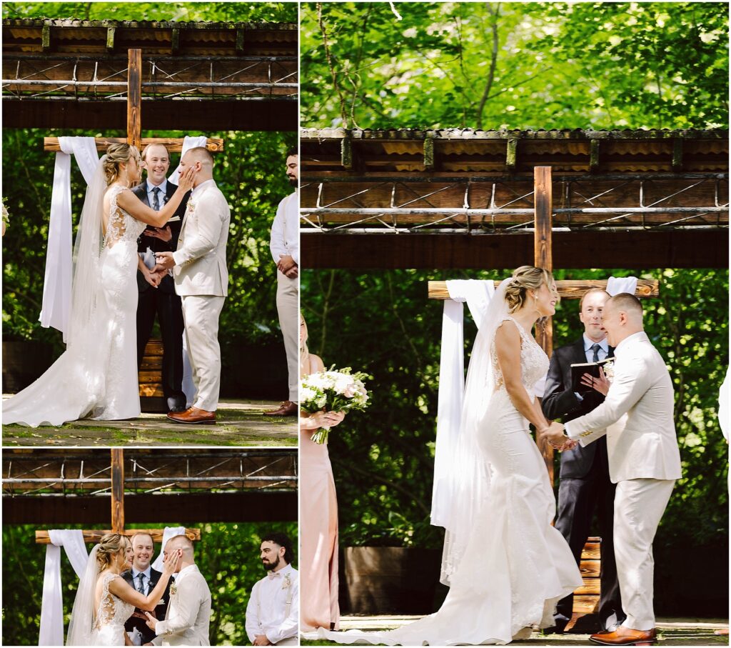 Snohomish Wedding Photographer GSquared Weddings A bride and groom exchange vows in an outdoor wedding ceremony The bride is wearing a white dress and the groom is in a light suit They are standing under a wooden arbor decorated with white fabric surrounded by lush greenery Serving Seattle Snohomish and Washington State Snohomish Wedding Photographer GSquared Weddings A bride and groom exchange vows in an outdoor wedding ceremony. The bride is wearing a white dress, and the groom is in a light suit. They are standing under a wooden arbor decorated with white fabric, surrounded by lush greenery. Serving Seattle, Snohomish and Washington State
