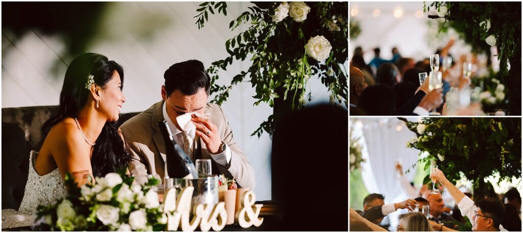 Snohomish wedding photographer gsquared weddings a bride and groom sit together the groom wiping tears at a wedding reception Nearby guests raise glasses in a toast The setting is adorned with white flowers and greenery Serving seattle snohomish and washington state