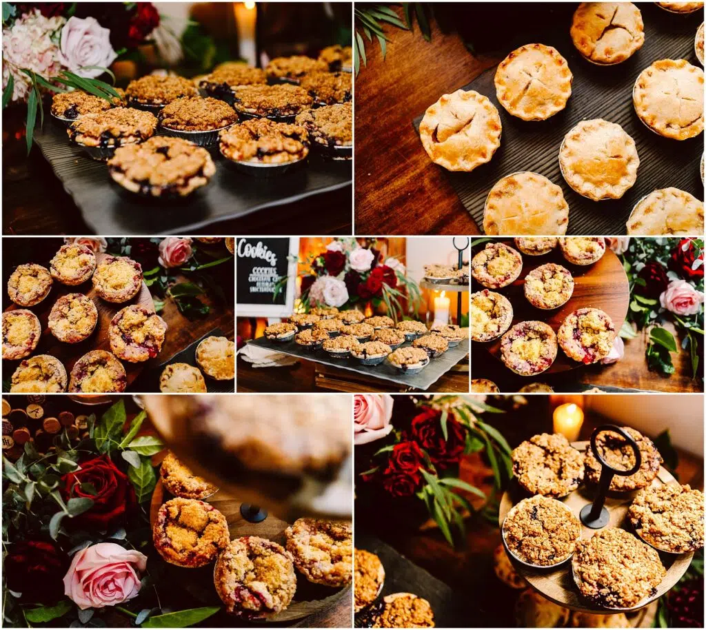 Snohomish Wedding Photographer GSquared Weddings An assortment of small pies and crumbles on display Some are on dark trays while others are arranged on tiered stands surrounded by decorative greenery and roses A small blackboard sign reading Cookies is visible The scene is warm and inviting Serving Seattle Snohomish and Washington State Snohomish Wedding Photographer GSquared Weddings An assortment of small pies and crumbles on display. Some are on dark trays, while others are arranged on tiered stands surrounded by decorative greenery and roses. A small blackboard sign reading Cookies is visible. The scene is warm and inviting. Serving Seattle, Snohomish and Washington State