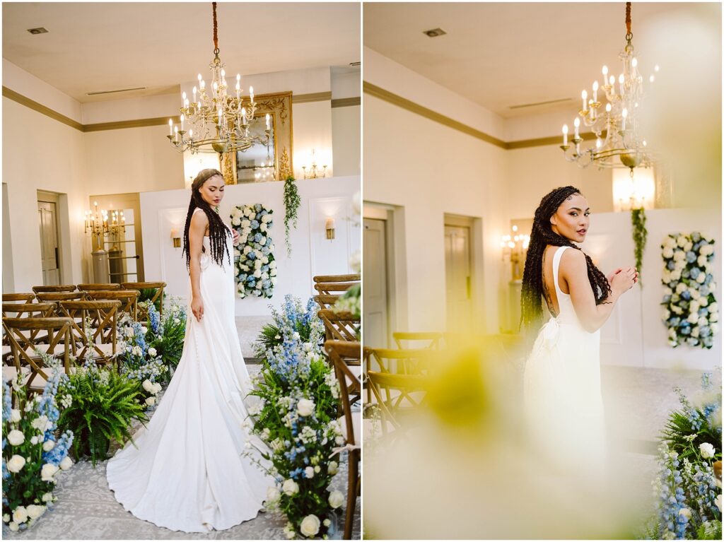 Snohomish wedding photographer gsquared weddings a bride in a white gown stands in a decorated venue with chandeliers wooden chairs and floral arrangements featuring blue and white flowers Her hair is styled in long braids The setting is elegant and romantic Serving seattle snohomish and washington state Snohomish wedding photographer gsquared weddings a bride in a white gown stands in a decorated venue with chandeliers wooden chairs and floral arrangements featuring blue and white flowers Her hair is styled in long braids The setting is elegant and romantic Serving seattle snohomish and washington state