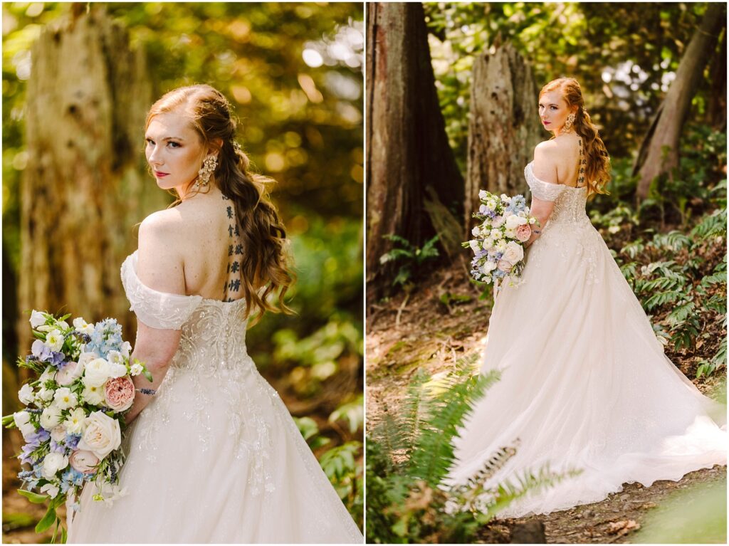 Snohomish wedding photographer gsquared weddings a bride with long wavy red hair stands in a forest wearing an off-the-shoulder lace wedding gown with a long train She holds a bouquet of blue white and pink flowers and gazes back at the camera Sunlight filters through the trees Serving seattle snohomish and washington state Snohomish wedding photographer gsquared weddings a bride with long wavy red hair stands in a forest wearing an off the shoulder lace wedding gown with a long train She holds a bouquet of blue white and pink flowers and gazes back at the camera Sunlight filters through the trees Serving seattle snohomish and washington state