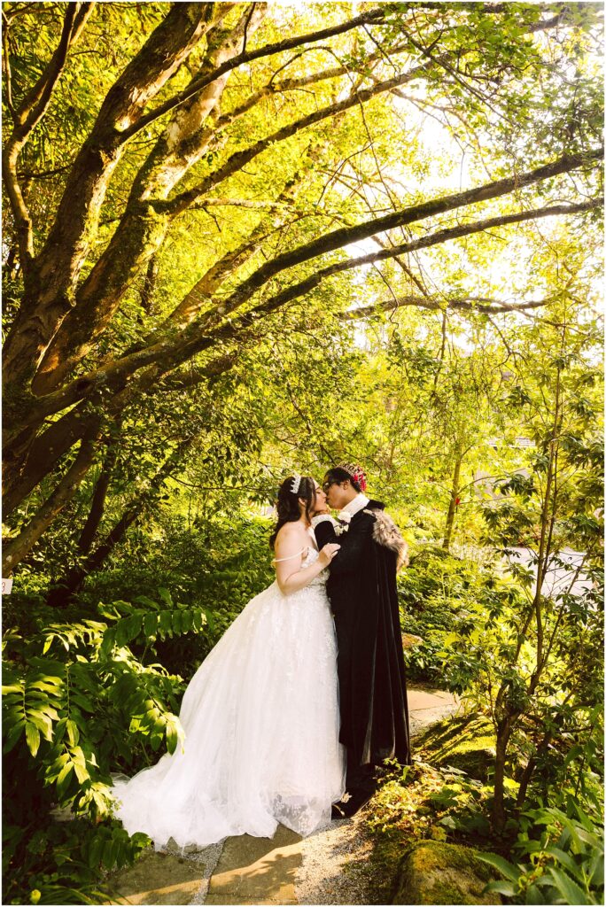 Snohomish wedding photographer gsquared weddings a couple in wedding attire stand together in a lush sunlit garden The bride wears a white dress and the groom a black suit They appear to be sharing an intimate moment surrounded by vibrant greenery and dappled sunlight filtering through the trees Serving seattle snohomish and washington state Snohomish wedding photographer gsquared weddings a couple in wedding attire stand together in a lush sunlit garden The bride wears a white dress and the groom a black suit They appear to be sharing an intimate moment surrounded by vibrant greenery and dappled sunlight filtering through the trees Serving seattle snohomish and washington state