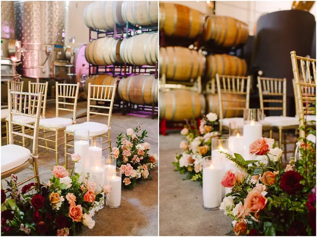 Snohomish Wedding Photographer GSquared Weddings Rows of gold chairs are arranged indoors beside large wine barrels Floral arrangements with red pink and orange flowers accompanied by lit candles decorate the aisle The setting has a warm and inviting atmosphere Serving Seattle Snohomish and Washington State Snohomish Wedding Photographer GSquared Weddings Rows of gold chairs are arranged indoors beside large wine barrels. Floral arrangements with red, pink, and orange flowers, accompanied by lit candles, decorate the aisle. The setting has a warm and inviting atmosphere. Serving Seattle, Snohomish and Washington State