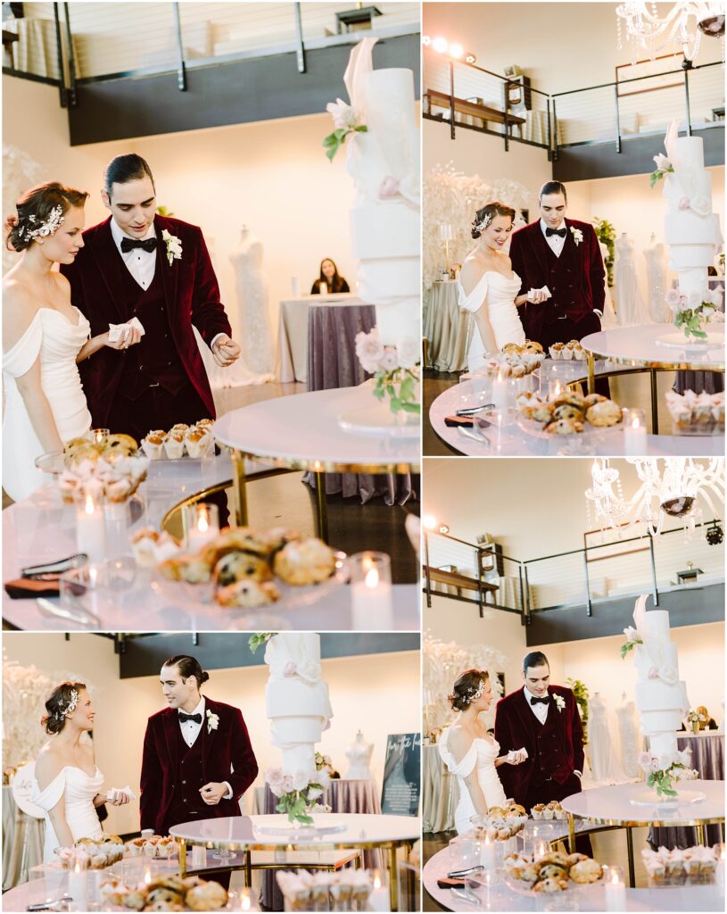 Snohomish Wedding Photographer GSquared Weddings A couple, dressed in formal attire with the man in a burgundy suit, are engaged in a wedding cake-cutting ceremony. The setting is elegantly decorated with flowers, candles, and a large tiered cake on a table. Serving Seattle, Snohomish and Washington State