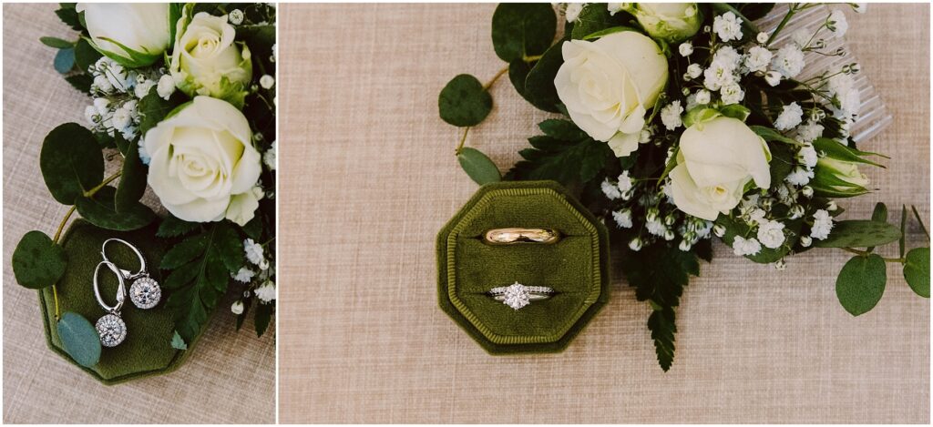Snohomish Wedding Photographer GSquared Weddings A green velvet box displaying a diamond ring and a gold band is placed between bouquets of white roses and greenery. Silver earrings adorned with sparkling stones are next to one of the bouquets on a beige textured surface. Serving Seattle, Snohomish and Washington State