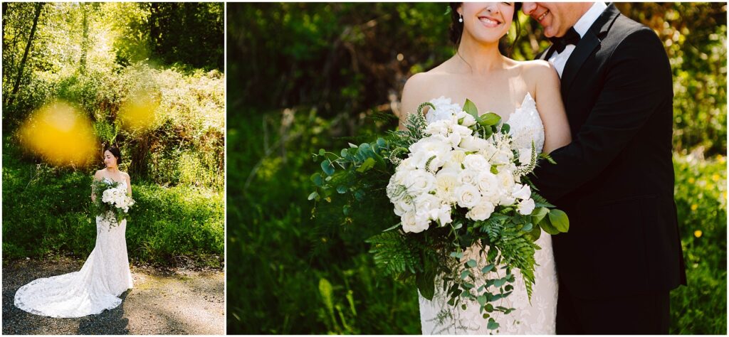 Snohomish Wedding Photographer GSquared Weddings A bride in a lace wedding dress holds a large bouquet of white roses and green foliage. She stands in a sunlit, wooded area. A groom in a black suit embraces her from the side, both smiling. The background is lush and green. Serving Seattle, Snohomish and Washington State