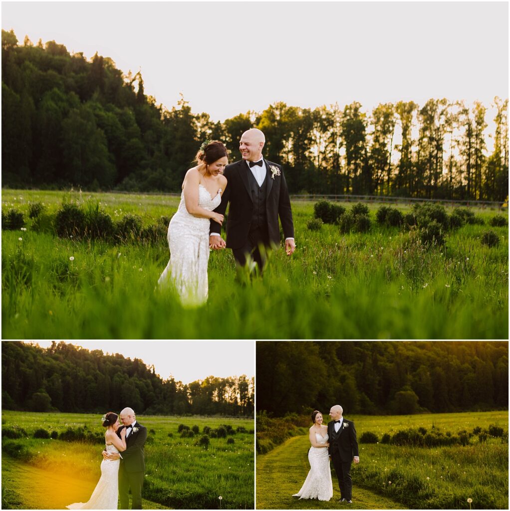 Snohomish Wedding Photographer GSquared Weddings A couple in wedding attire walks and embraces in a vibrant green field with trees in the background. The sun is setting, casting a warm glow over the scene. They appear joyful and relaxed, enjoying their moment together in nature. Serving Seattle, Snohomish and Washington State