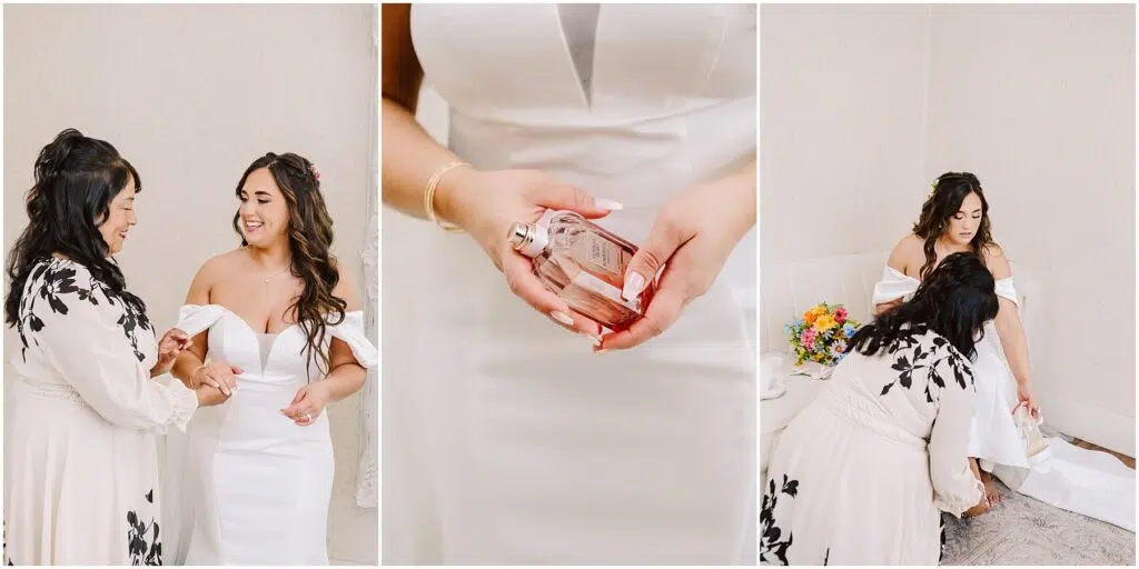 Snohomish Wedding Photographer GSquared Weddings A bride in a white gown with off-the-shoulder sleeves shares a moment with a woman in a floral dress, reminiscent of serene Machias sunsets. She holds a perfume bottle and later adjusts her shoe near a bouquet of colorful flowers on the sofa. Serving Seattle, Snohomish and Washington State