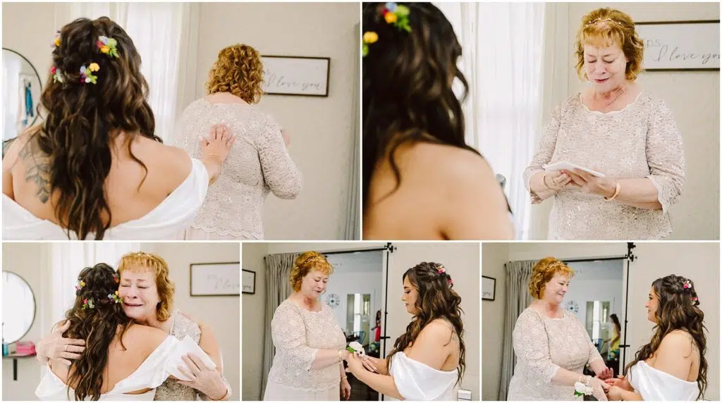 Snohomish Wedding Photographer GSquared Weddings In a warmly lit room in Machias, a bride in a white gown shares an emotional moment with an older woman in a light pink dress. They hug, laugh, and hold hands. Both have flowers in their hair, beneath a wall sign reading I Love You. Serving Seattle, Snohomish and Washington State