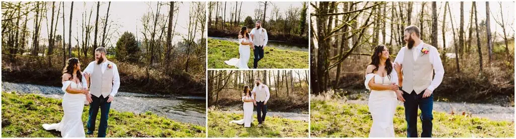 Snohomish Wedding Photographer GSquared Weddings A couple in wedding attire strolls along the grassy riverbank in Machias. The bride, in a white dress holding a bouquet, walks beside the groom sporting a white shirt and vest. Theyre framed by bare trees under a bright, clear sky. Serving Seattle, Snohomish and Washington State