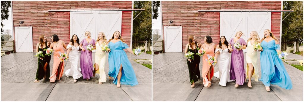 Snohomish Wedding Photographer GSquared Weddings Five women in colorful dresses stroll together, smiling and holding bouquets. They pose in front of a red wooden barn with white sliding doors—a charming scene reminiscent of Machias. The paved ground underfoot contrasts with the green trees and an overcast sky as their backdrop. Serving Seattle, Snohomish and Washington State