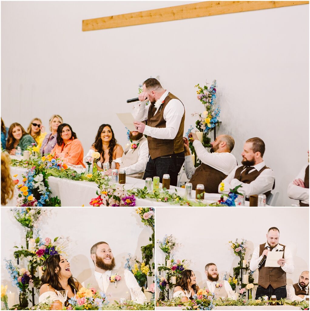 Snohomish Wedding Photographer GSquared Weddings A man in a vest reads from a paper at a festive wedding reception in Machias. A long table adorned with colorful flowers hosts cheerful guests. Nearby, two photos capture the laughing couple beside him, enhancing the joyful and celebratory mood. Serving Seattle, Snohomish and Washington State