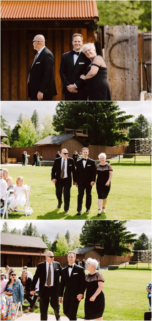 Snohomish Wedding Photographer GSquared Weddings A wedding scene unfolds at a charming winery, with the groom in a black suit flanked by an older man wearing sunglasses and an older woman in a black dress. They stroll across the grass, as onlookers seated nearby admire the rustic wooden buildings that dot the vineyard landscape. Serving Seattle, Snohomish and Washington State