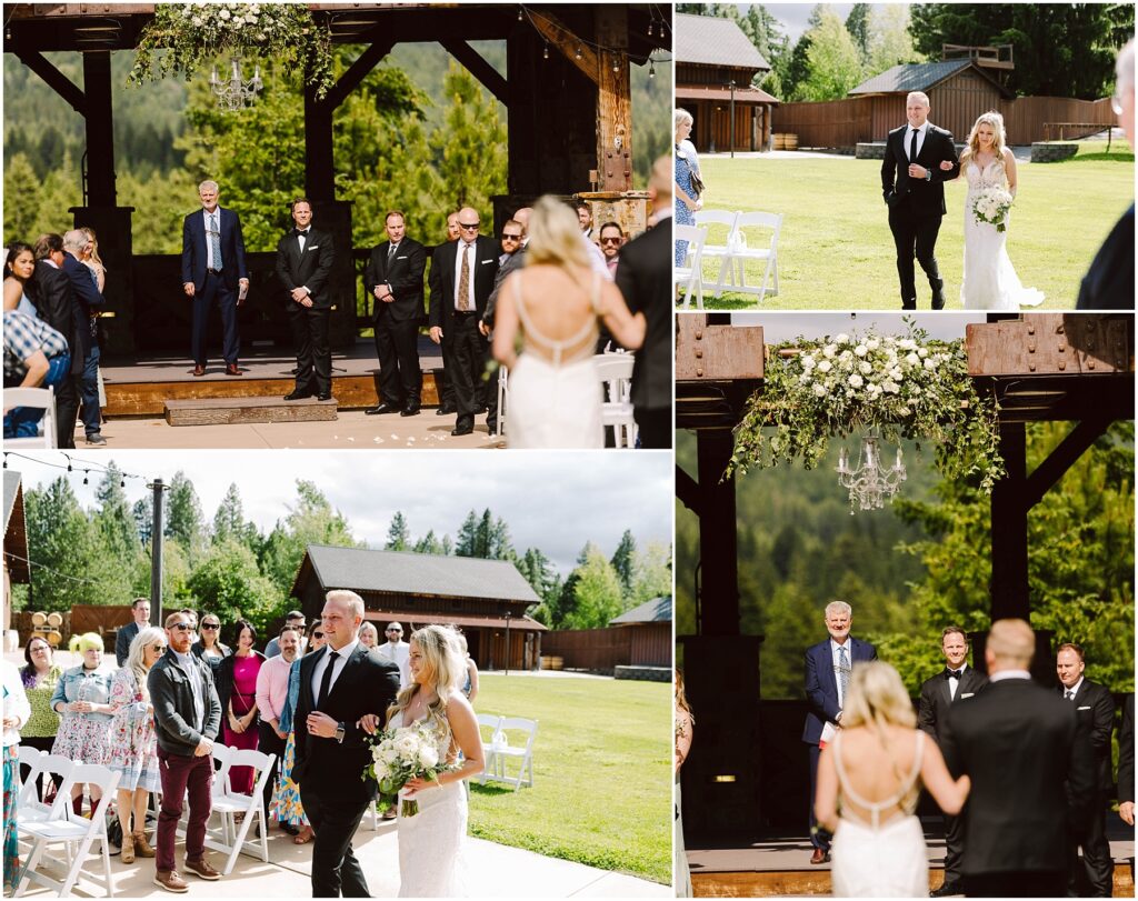 Snohomish Wedding Photographer GSquared Weddings A bride in a white gown walks down an outdoor aisle at a scenic winery with a man in a suit. Guests are seated on either side. The venue showcases a wooden arch adorned with greenery and flowers, surrounded by trees, offering a stunning mountain view on this sunny day. Serving Seattle, Snohomish and Washington State