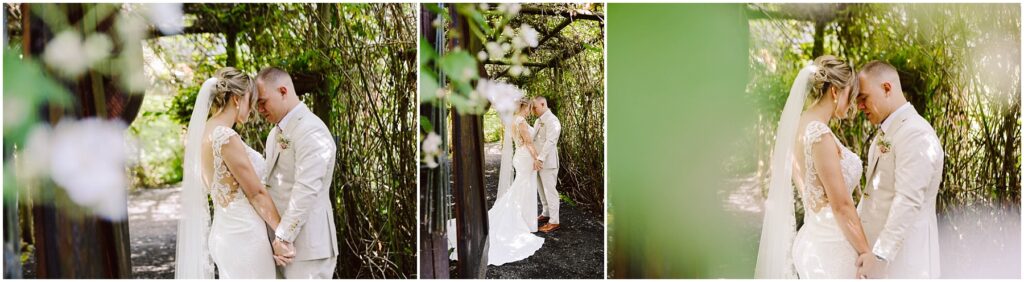 Snohomish Wedding Photographer GSquared Weddings A bride and groom stand close under a leafy pergola in Snohomish holding hands and touching foreheads The bride wears a white gown with lace details and the groom is in a light beige suit The scene is serene and intimate surrounded by lush greenery Serving Seattle Snohomish and Washington State Snohomish Wedding Photographer GSquared Weddings A bride and groom stand close under a leafy pergola in Snohomish, holding hands and touching foreheads. The bride wears a white gown with lace details, and the groom is in a light beige suit. The scene is serene and intimate, surrounded by lush greenery. Serving Seattle, Snohomish and Washington State