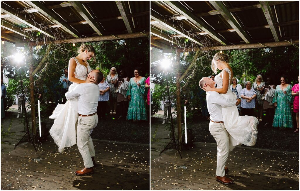 Snohomish Wedding Photographer GSquared Weddings A groom lifts the bride joyfully under a wooden pergola in Snohomish Guests stand in the background smiling The bride wears a white gown and the groom is in lightcolored attire The scene is festive with string lights and scattered petals Serving Seattle Snohomish and Washington State Snohomish Wedding Photographer GSquared Weddings A groom lifts the bride joyfully under a wooden pergola in Snohomish. Guests stand in the background, smiling. The bride wears a white gown, and the groom is in light-colored attire. The scene is festive with string lights and scattered petals. Serving Seattle, Snohomish and Washington State