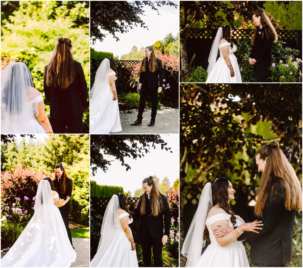Bride in a white wedding gown with veil stands with a groom in a black suit in a sunlit garden