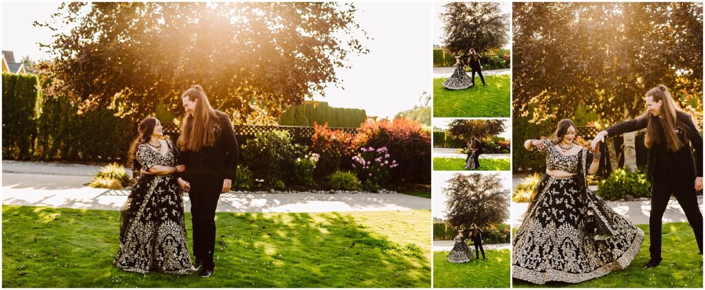 Couple dancing in a sunlit garden woman in an ornate black and gold lehenga and man in a black suit smile at each other as they hold hands